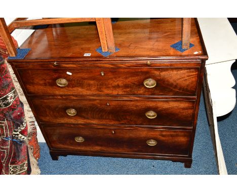 A GEORGIAN OAK MAHOGANY AND BANDED CHEST OF THREE GRADUATING DRAWERS with a brushing slide, on small bracket feet, width 94cm
