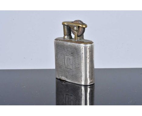 A silver pocket lighter, stamped T&amp;S, possibly E.J Trevitt &amp; Sons, with engine turned design, with initialled cartouc
