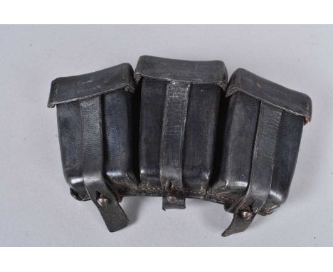 A WWII German K98 ammunition pouch, stamped Leipzig 1940 to the reverse, with three pouches