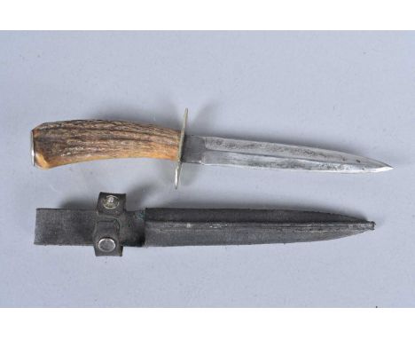 A WWI German Trench Knife, the FS style double edged blade, 13cm, dated 1915, with antler handle, complete with scabbard