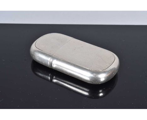 An Adie Brothers Ltd silver pocket lighter, dated Birmingham 1923, with curved edges, with engine turned panels to either sid