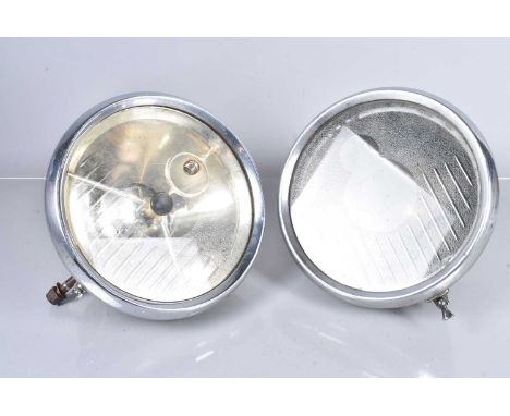 A Lucas P100 Bullseye Car lamp, together with another Lucas P100 Bullseye headlamp case