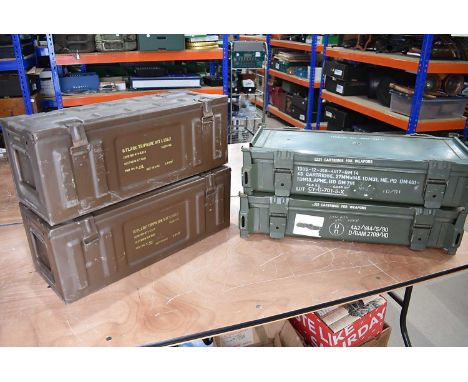 A group of four Ammunition Cases, comprising two 6x Flare Tripwire Kits, and two 27mm cartridge cases (4)
