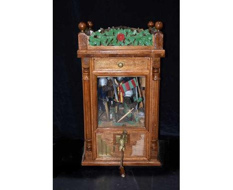 A Vintage 'Fighting Knights' Amusement Machine, with numerous Knights to the inside, glazed to the front and rear, with damag