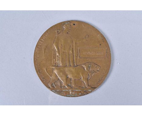 A WWI Memorial Plaque, awarded to George Reed, multiple possible recipients, with drill hole to the top