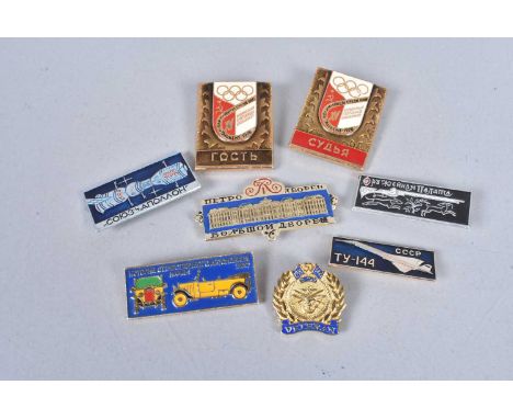 A small selection of Russian badges, covering various subject matter, in including hunting, Olympics, aviation, motoring and 