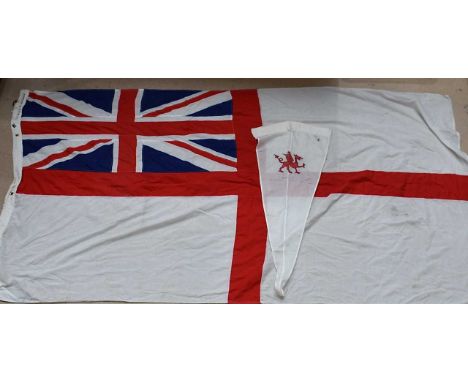 A large White Ensign Naval Flag, believe to be from HMS Glamorgan, stamped with Broad Arrow, White Ensign 6 and number 571329