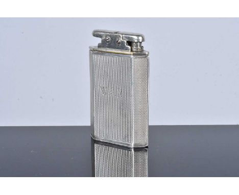 A hexagonal silver pocket lighter, stamped T&amp;S, possibly E.J Trevitt &amp; Sons, stamped sterling silver, with engine tur