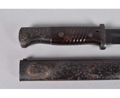 A German K98 Matching Number Bayonet, by F.W.Holler, dated 38 to the spine of the 25cm long blade, serial number 5454h, compl