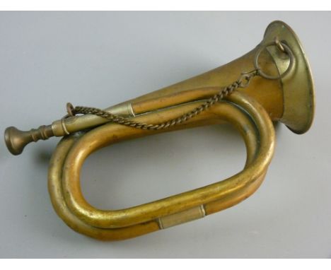 A WORLD WAR II PERIOD BRASS BUGLE marked 'Meinel & Herold, Klingenthal' with silvered mounts and brass chain, 28 cms long