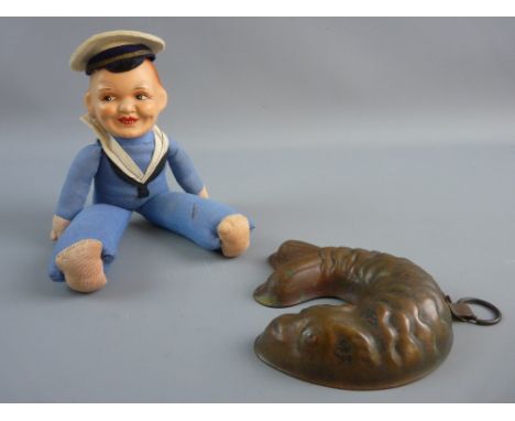 A VINTAGE SAILOR BOY DOLL and copper fish shaped chocolate mould, the composite painted head and soft bodied doll in sailor's