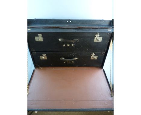 A VINTAGE CAR LUGGAGE TRUNK by Dunhills of London having clip fasteners and central lock, drop down front with interior cases