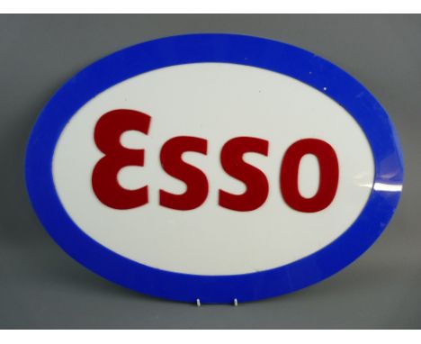 A PERSPEX OVAL ESSO GARAGE SIGN, 60 cms wide approximately