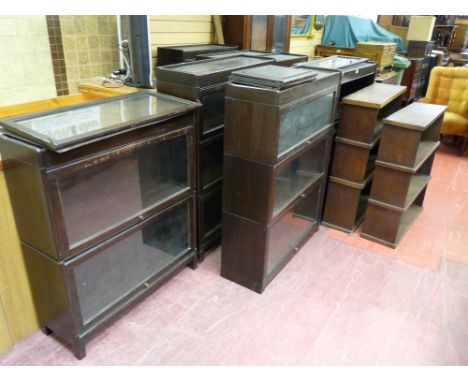 FOUR GLOBE WERNICKE STYLE POLISHED BOOKCASES each having three glass fronted doors and a pair of polished three shelf open oa