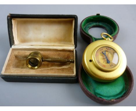 A HARRODS LIMITED GILT BRASS CASED TRAVEL COMPASS AND BAROMETER in original fitted case along with an antique brass miniature