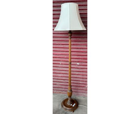 An oak standard lamp 