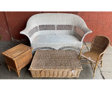 A white painted wicker sofa, a child's chair, sewing basket, etc. 