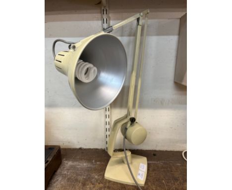 A cream metal anglepoise desk lamp 