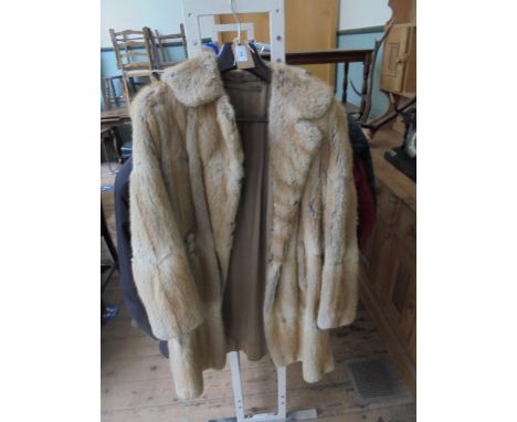Ladies lined 3/4 length light fur coat