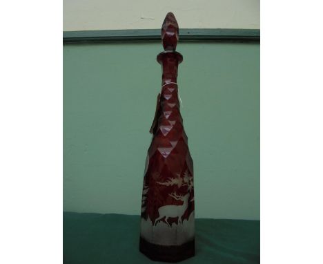 Large 19th Century Bohemian ruby red Intaglio engraved decanter with stopper unusually faceted, (41 1/2 cm tall )