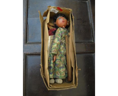 Pelham puppet of Native girl in plain box