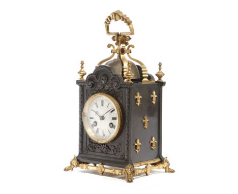 A FRENCH GILT BRASS MOUNTED CARRIAGE CLOCK IN GOTHIC REVIVAL STYLE LATE 19TH CENTURY the brass drum eight day movement with a