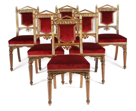 λ A SET OF SIX GEORGE IV ROSEWOOD AND PARCEL GILT GOTHIC REVIVAL SIDE CHAIRS ATTRIBUTED TO MOREL AND SEDDON, C.1830 the top r