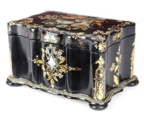 A VICTORIAN PAPIER-MACHE TEA CADDY C.1860 inlaid with mother of pearl and decorated with flowers and leaves with gilt highlig