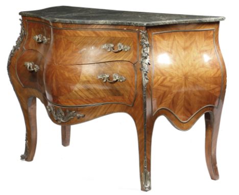 A KINGWOOD COMMODE IN LOUIS XV STYLE 20TH CENTURY with gilt brass mounts, the serpentine marble top above two long drawers 86