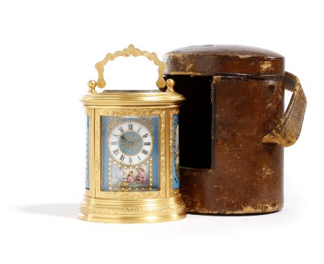 A FRENCH MINIATURE BRASS AND PORCELAIN OVAL CARRIAGE CLOCK LATE 19TH CENTURY the brass movement with a platform lever escapem