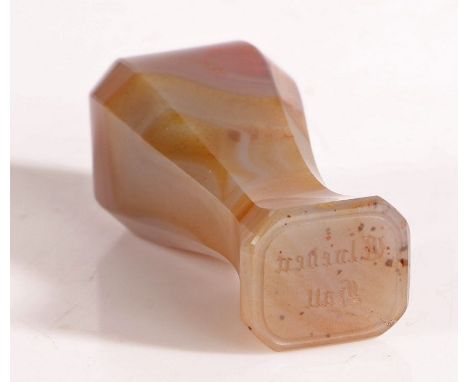 Elveden Hall- A cloudy-grey agate desk seal, circa 1900, of inverted baluster form with chamfered edges, the integral matrix 