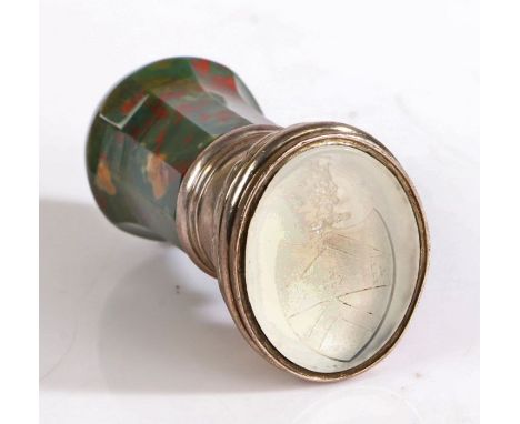 A bloodstone, white metal and chalcedony desk seal, the facetted chalcedony handle above a gadrooned cushion and chalcedony m