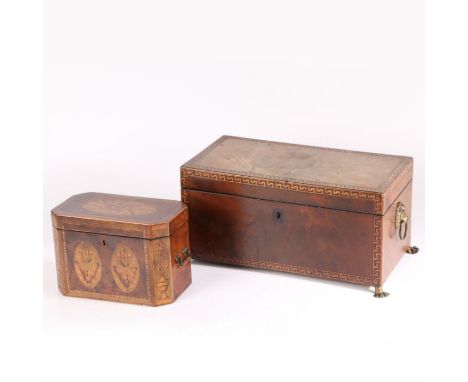 A 19th century mahogany Greek key inlaid tea caddy with internally fitted tea cannisters and glass mixing bowl, with brass li