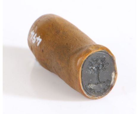 A double-ended hardstone desk seal, English, late 19th/early 20th Century, the natural rough flint of slightly undulating cyl