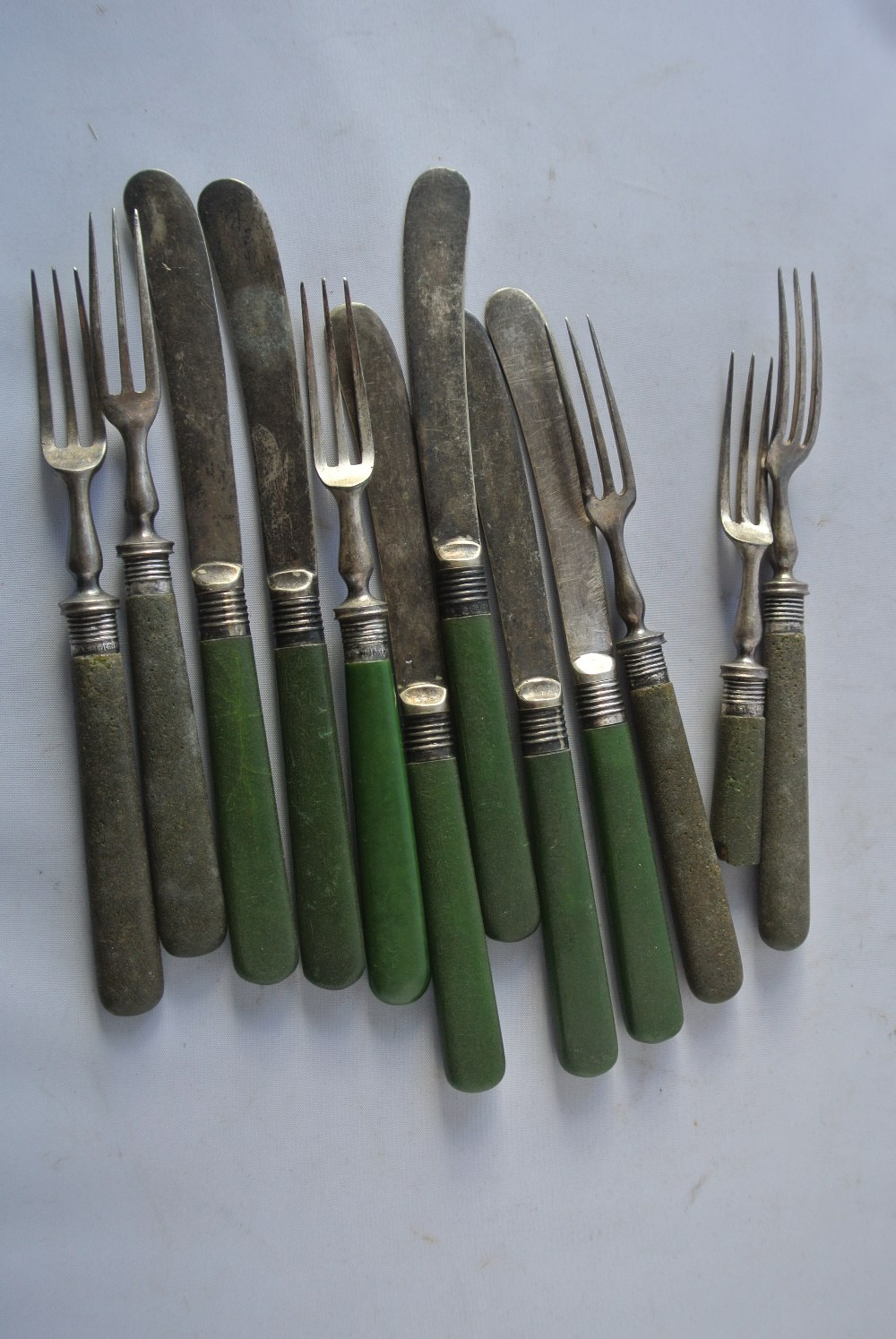 SILVER A set of 6 vintage/ antique knives & forks with green handles