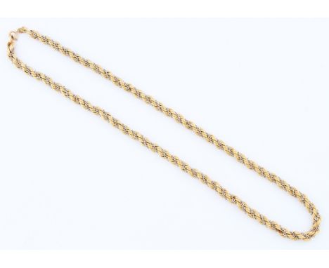 A 9ct yellow gold twist design necklet, featuring white metal chain twisted through, hallmarked with London import mark for 1