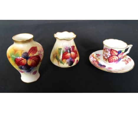 A group of Royal Worcester Kitty Blake items to include a shouldered vase with 1938 date mark and another squat vase with fri