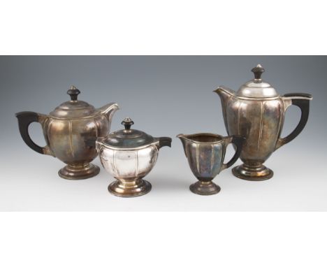 A Christofle silver plated four piece tea set, comprising of a tea pot, water jug, lidded sugar bowl and milk jug, of Art Dec