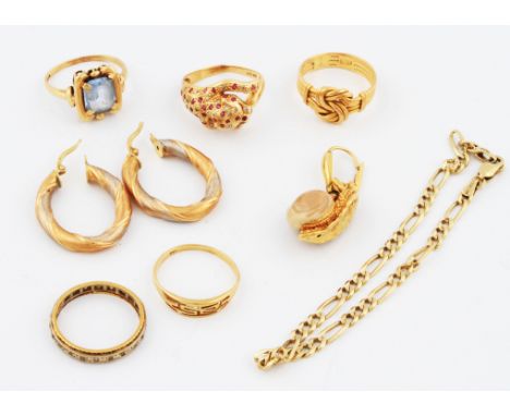 A lot to include a ruby and diamond leopard design ring, stamped 585, ring size O (ring body not round), a yellow metal curb 