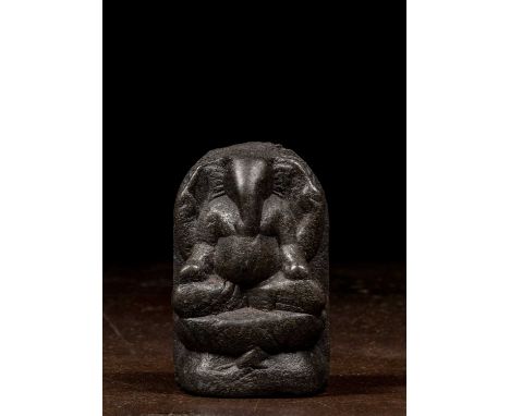 Dimensions: Height 9 cm Wide 5,5 cm Depth 2,6 cmWeight: 227 grams This compact and powerfully modeled stone sculpture represe