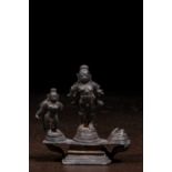 BRONZE TRIAD OF KRISHNA AND TWO STANDING SCULPTURES INDIA 15TH CENTURY