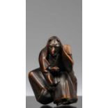 NETSUKE OF A PERFORMING MONKEY IN A KIMONO