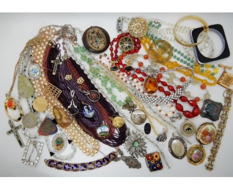 A collection of vintage costume jewellery to include, a C. Fox retro pendant, citrine beads, a General service Corps sweethea