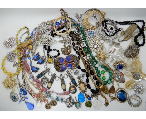 A collection of vintage costume jewellery to include, a Jorgen Jensen pewter pendant, retro items Malachite beads etc Conditi