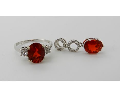 An 18ct white gold ring set with diamonds and a Salamanca fire opal, finger size N1/2, with a similar pendant length 2.3cm, c