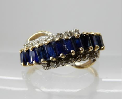 A 14k gold sapphire and diamond cluster ring, size O1/2, weight 3.4gms Condition Report: Available upon request