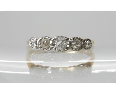 An 18ct gold five stone old cut diamond ring of estimated approx 0.25cts combined, size P, weight 2.6gms Condition Report: Mo