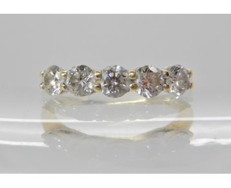 An 18ct gold five stone diamond ring estimated approx at 1ct combined, with insurance document stating diamonds are H colour,