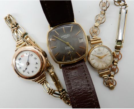 A 9ct gold cased gents Rotary watch and two ladies 9ct gold watch heads Condition Report: Available upon request