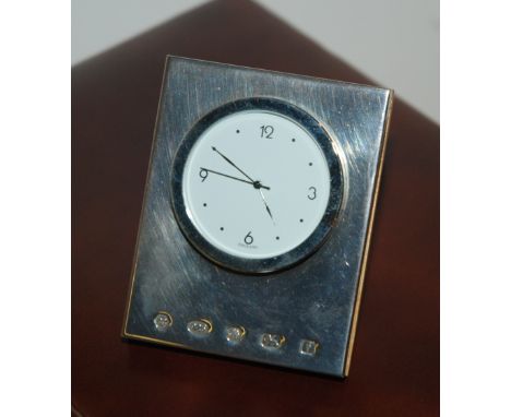 A modern silver travel clock, various coins, white-metal brushes, clay pipes etc Condition Report: Available upon request